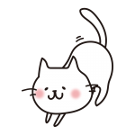 伸びをする白い猫