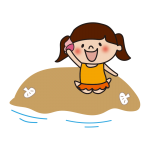 砂浜で貝殻を拾う子供（女の子）