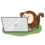 ノートパソコンを開くサル