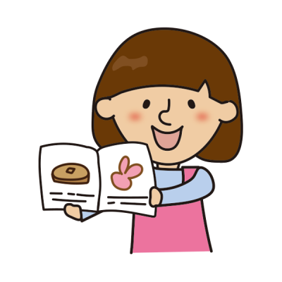 絵本を読む髪の短い保育士