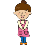 笑顔で立っているお団子の保育士