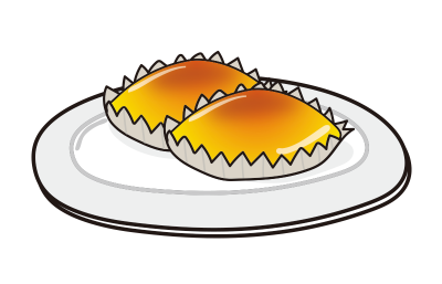 お皿にのった銀紙のついたスイートポテト