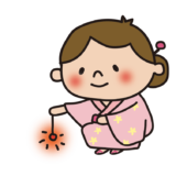 浴衣を着て線香花火をする子供（女の子）