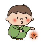 浴衣を着て線香花火をする子供（男の子）