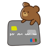 クレジットカードに乗るクマ