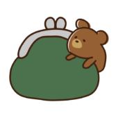 がま口の財布に乗るクマ