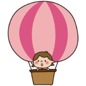 子供が乗ったピンク色の気球