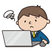 パソコンの操作に困っている新入社員の男の子