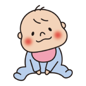 首をかしげて座っている赤ちゃん