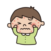 顔に湿疹ができて痒がる子供（男の子）