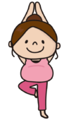 マタニティヨガで木のポーズをする女性
