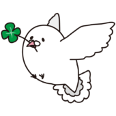 四葉のクローバーをくわえた白いハト