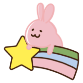 カラフルな流れ星に乗るウサギ