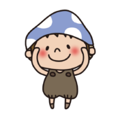 丸のポーズをしているきのこの格好をしている子供