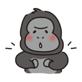 胸をたたいてドラミングしているゴリラ