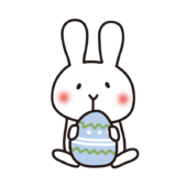 イースター・エッグを持っている白いうさぎ2