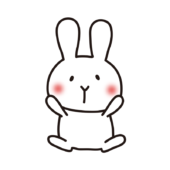 お腹を見せている白いうさぎ