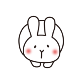 まるまっている白いうさぎ