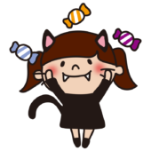 キャンディをたくさんもらった猫の仮装をした子供