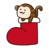 クリスマスブーツから顔を出すサル