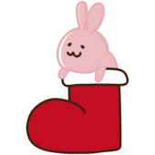 クリスマスブーツから顔を出すウサギ