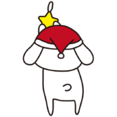 クリスマスの飾りつけをする白いうさぎ