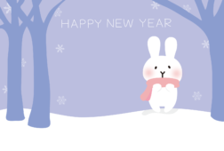 【年賀状】雪の中に立っている白いうさぎ