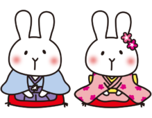 着物で新年のあいさつをする白いうさぎ