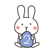 2の数字を持った白いうさぎ