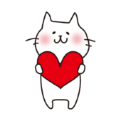 ハートを持っている白い猫