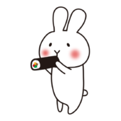 節分で恵方巻を食べる白いうさぎ