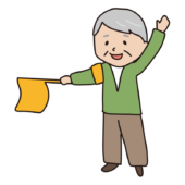 登校時の旗振りをするおじいさん2