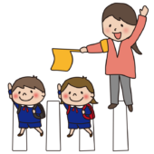 手をあげて横断歩道を渡る子供たちと旗振りをする女性2