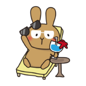 バカンスを楽しむうちにサングラスの形に日焼けした白いうさぎ