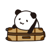 キャリーバッグに乗るパンダ