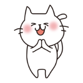 手を合わせている白い猫