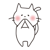 口をさわっている白い猫