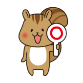 丸を出しているリス