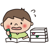 たくさんの宿題をしている子供（男の子）