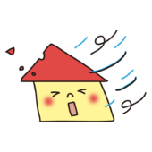 台風で飛ばされそうな家