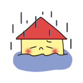 大雨で浸水した家