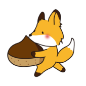 大きな栗を持っているキツネ