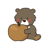 大きな梨を持っているクマ