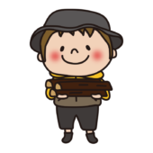 キャンプで薪を集める子供（男の子）