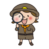 探検隊の格好をして虫眼鏡で観察する子供（女の子）