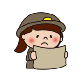 探検隊の格好をして地図を見る子供（女の子）