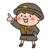 探検隊の格好をして遠くを指さす子供（男の子）