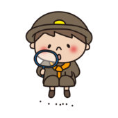 探検隊の格好をして虫眼鏡で観察する子供（男の子）