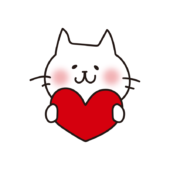 赤いハートを持った白い猫