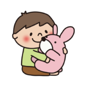 大きなウサギのぬいぐるみを抱いている子供（男の子）